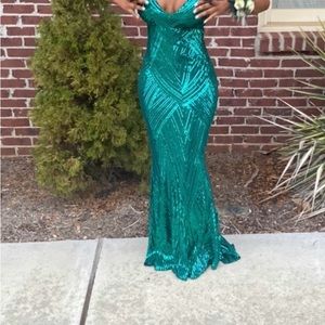 A beautiful green/bluish dress (depending on the lighting and area), & sequin